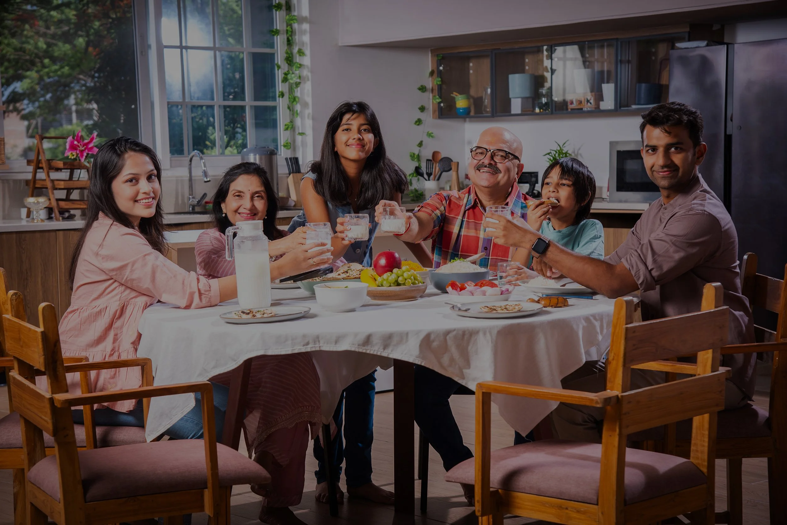 indian-family-having-lunch-at-home-on-dining-table-2026-03-17-00-48-12-utc.jpeg