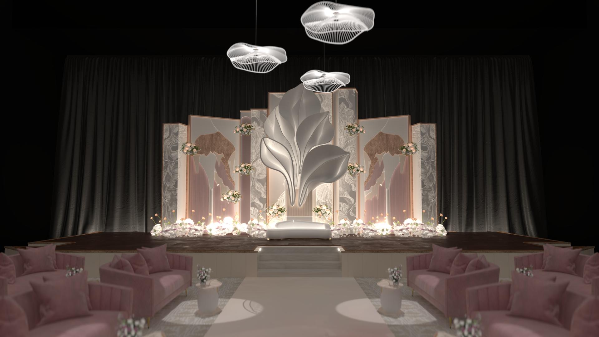 Elegant wedding stage with a large white floral sculpture in the center, surrounded by floral arrangements, pink sofas with pillows, and soft lighting.