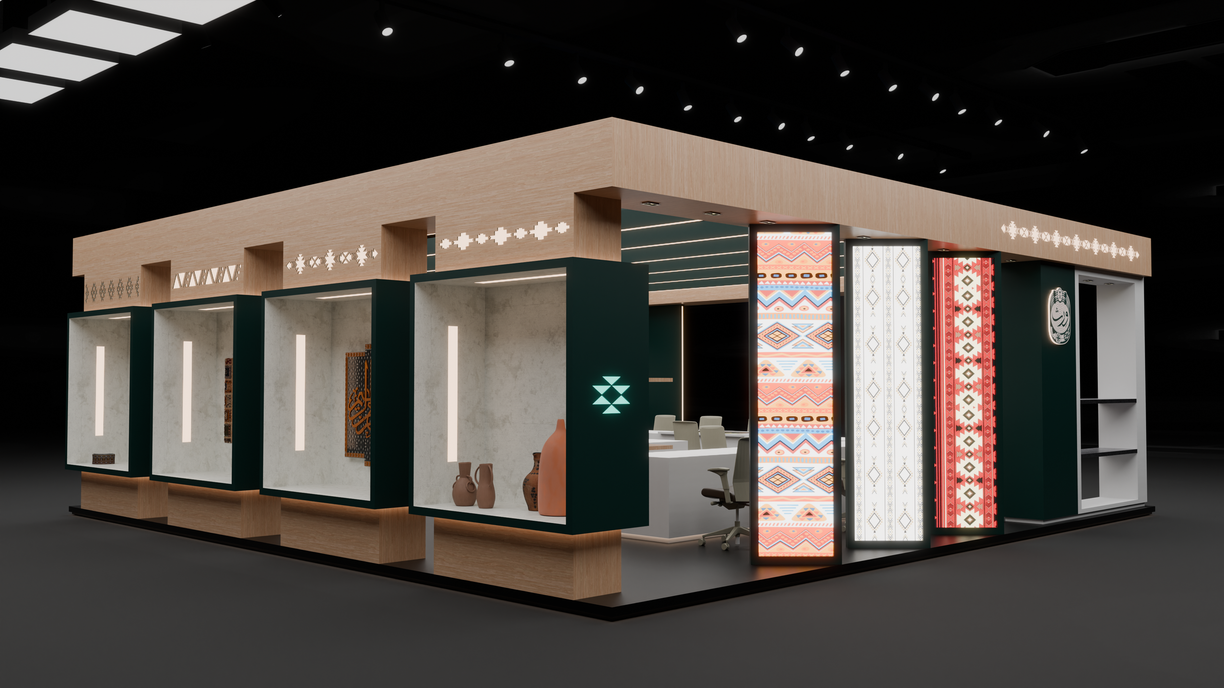 Interior view of a modern kiosk with decorative panels and artifacts, featuring a reception desk and seating area.