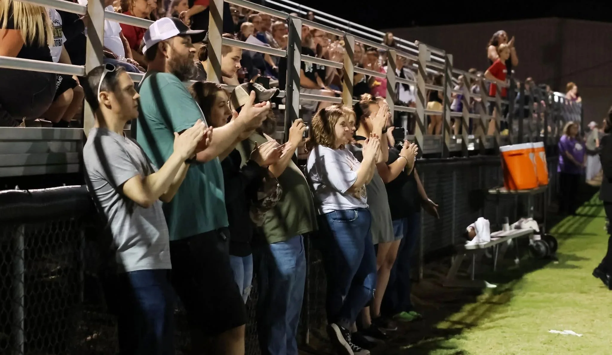  West Fork Tiger fans, left, are part of the Friday night environment.  (Photo by Nhi Blansett) . 