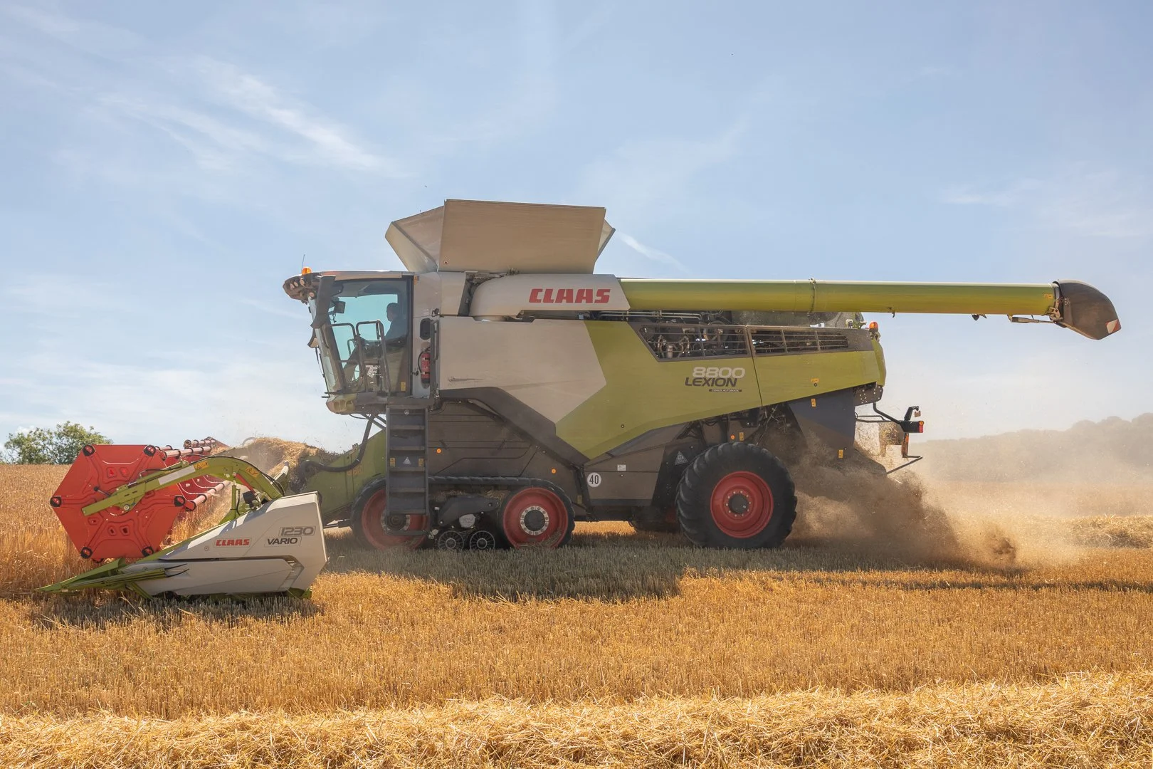 Modern combine harvester contract farming in South Oxfordshire