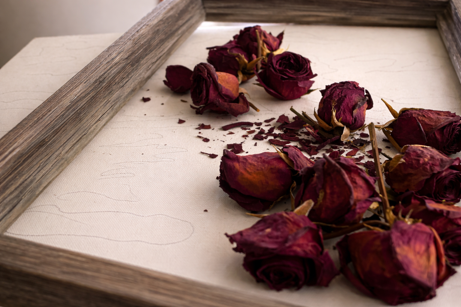 Dried wedding florals waiting to be preserved into custom art.
