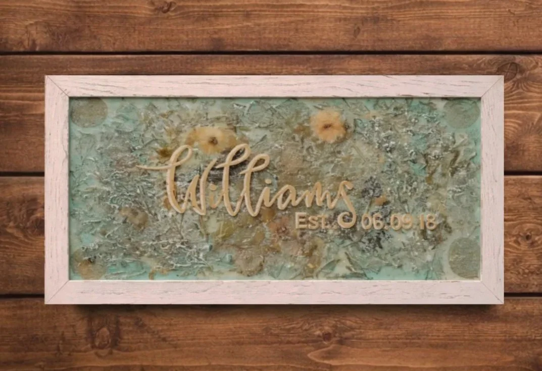 Floral preservation in Columbus, Ohio of wedding bouquet on canvas and personalized with last name.