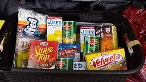 Pack Christmas Dinner Boxes for Neighbors in Need