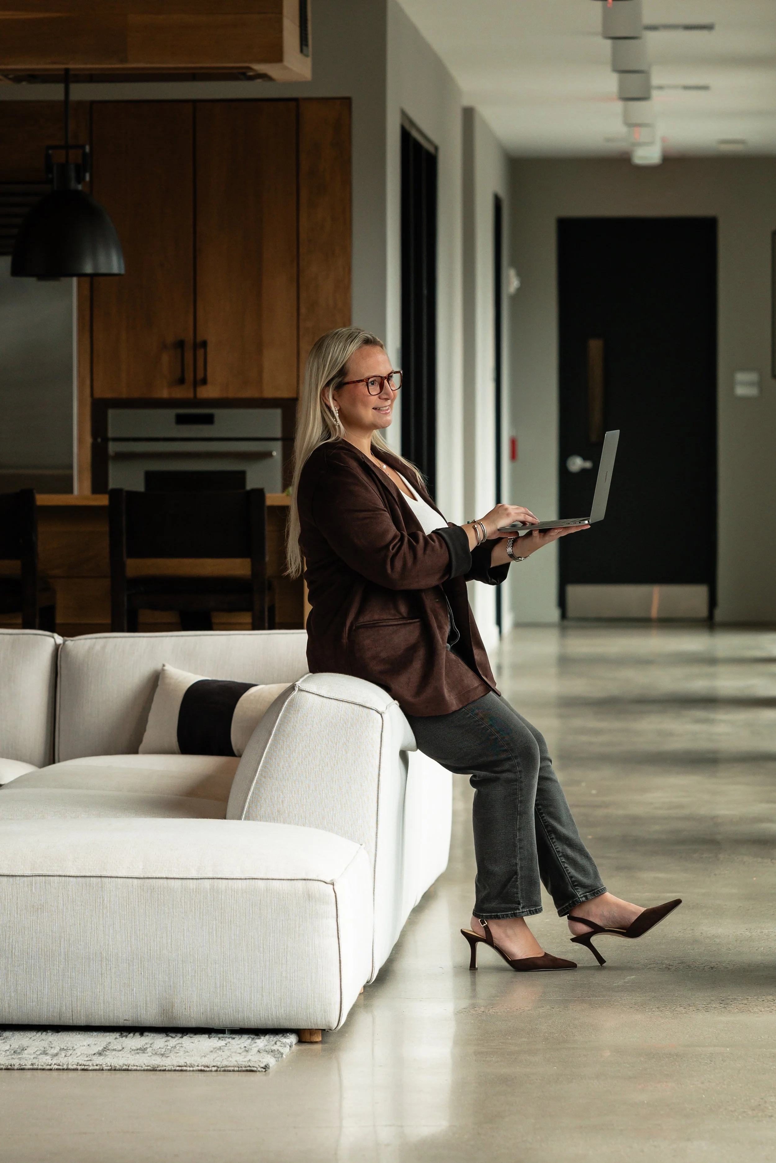 Dr Jessica Johnson, a psychiatric mental health nurse practitioner, with her laptop