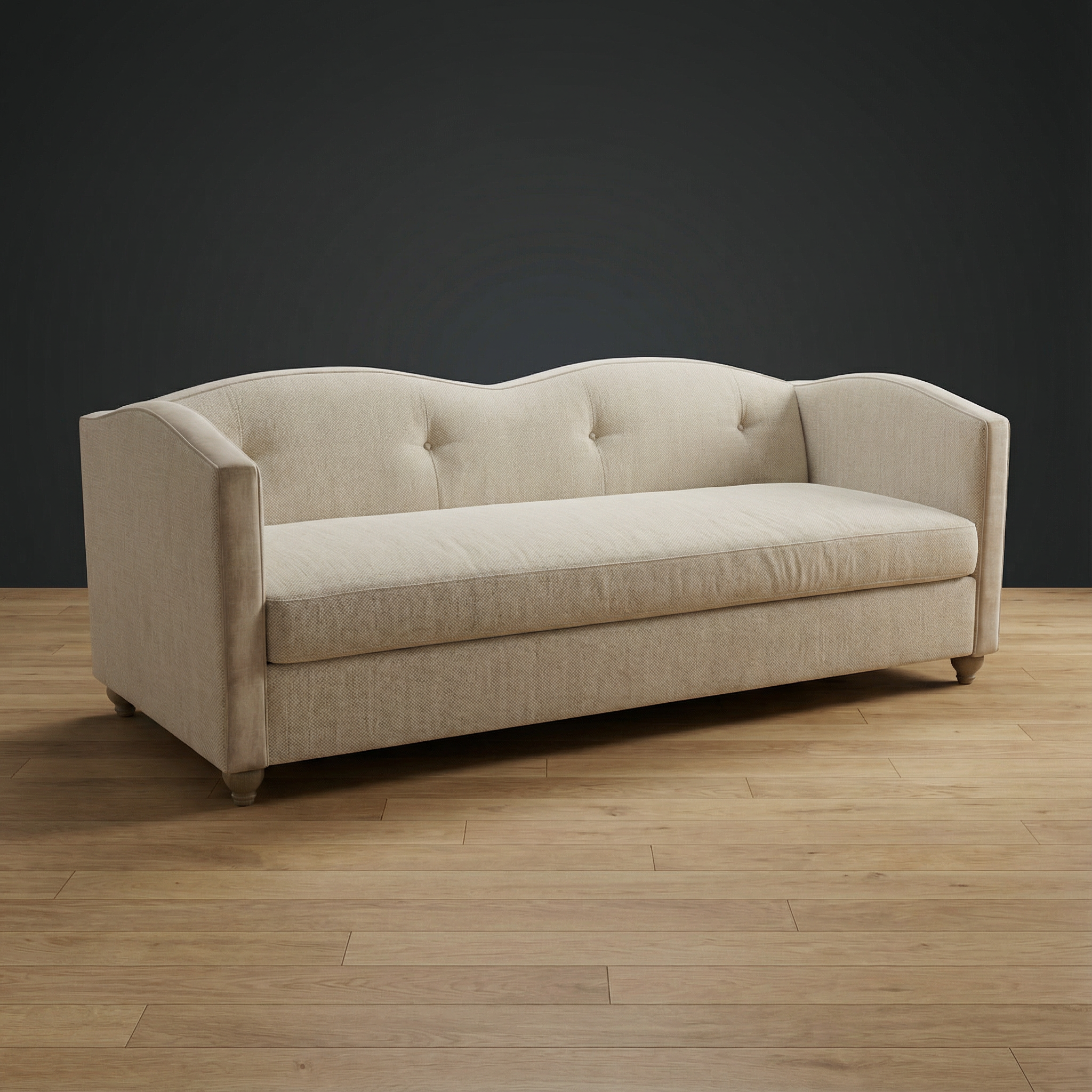 A beige upholstered sofa against a black wall in a room with light wood flooring.
