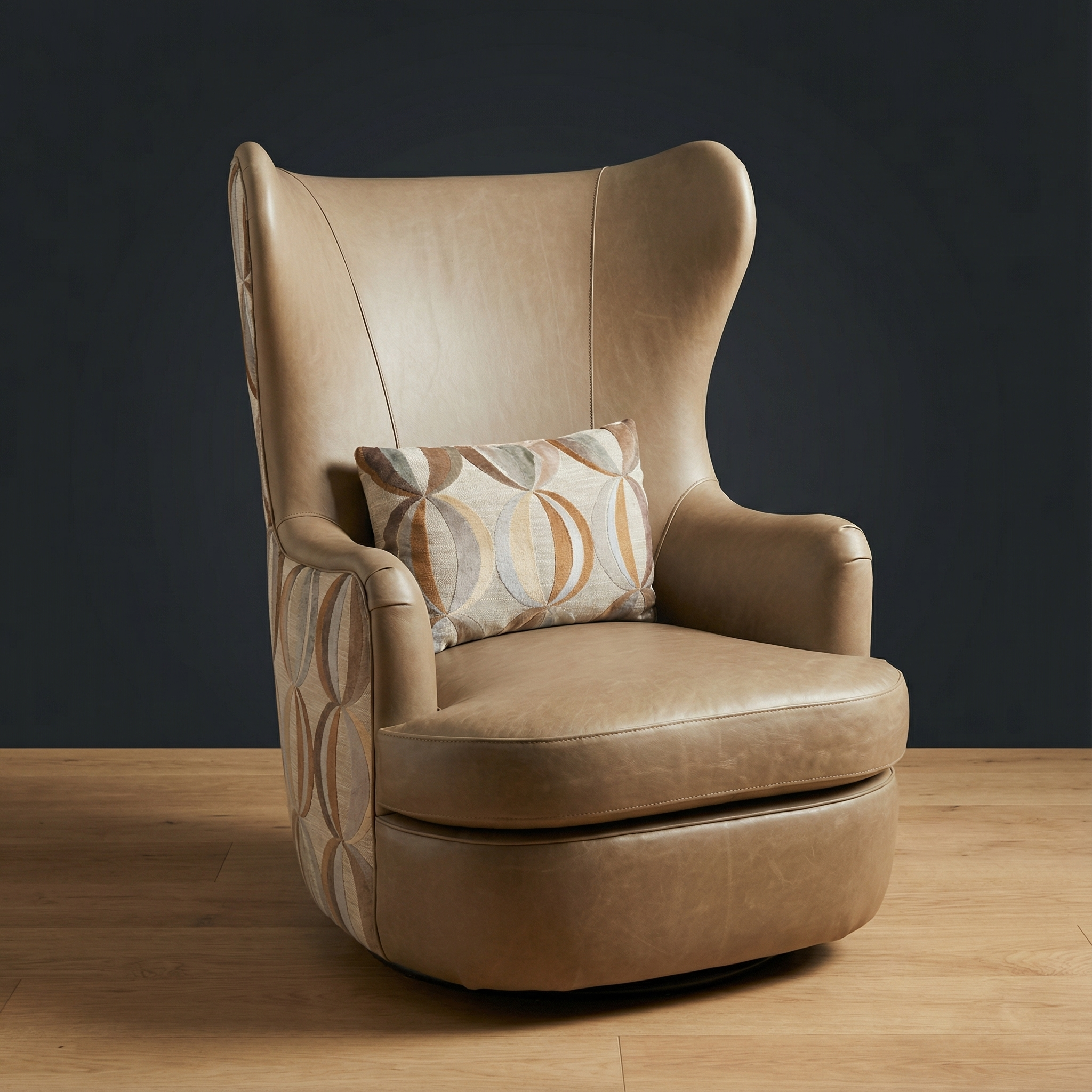 The Wayfarer Swivel Chair | modern wingback-style leather chair with geometric pillow | full 360° swivel