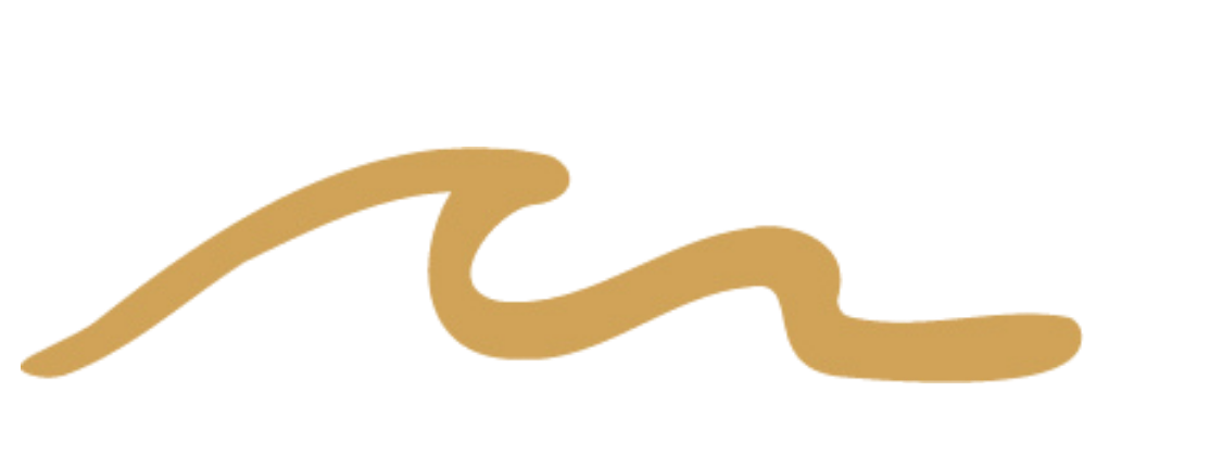 Close-up of a curvy, beige-colored object, possibly a candy or snack, on a black background.