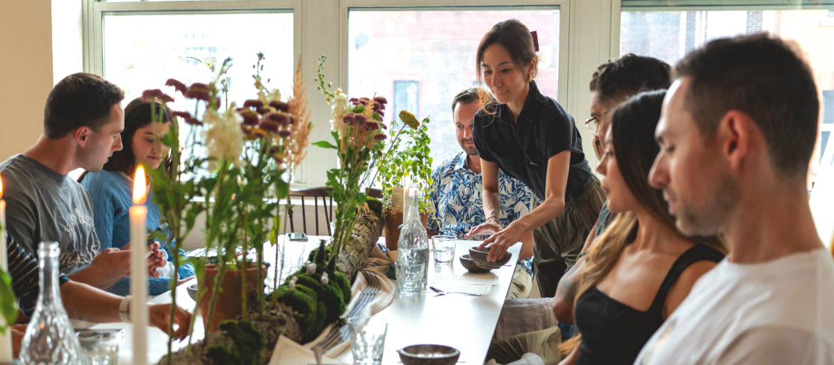 Nutritional Therapy Practitioner (NTP) Maggie hosting guests at nutritional supper club in Tribeca