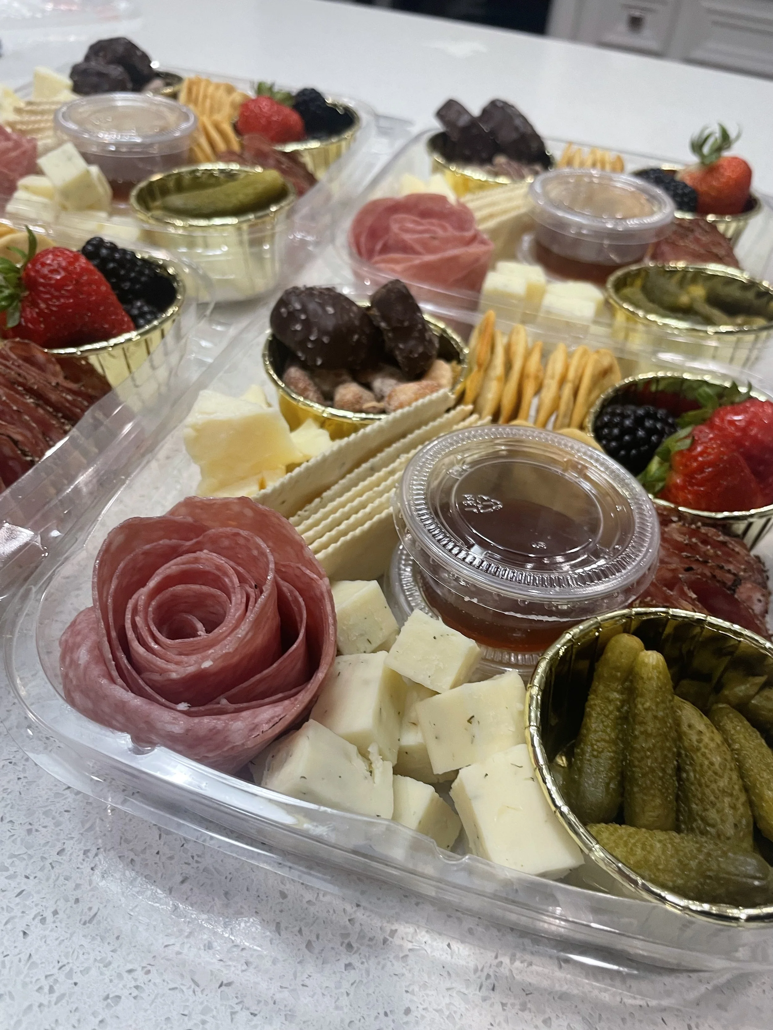 Extra sharp cheddar, strawberries, and chocolates