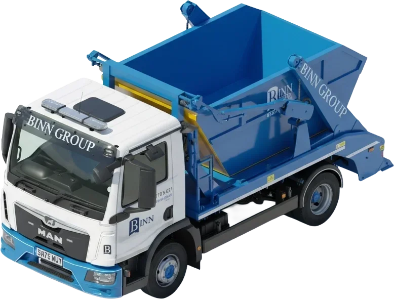 A white and blue dump truck with the Binn Group logo, viewed from above.