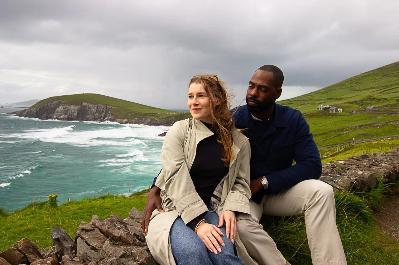 Man and woman on Irish cliffs