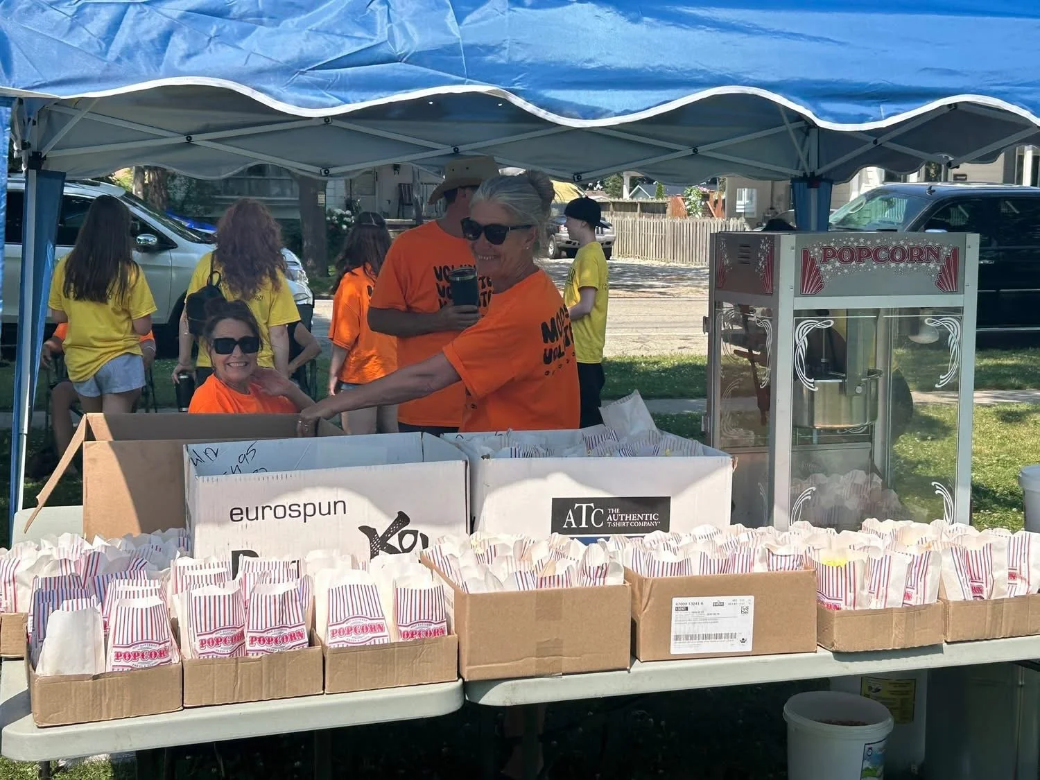 Making popcorn for everyone attending the Noelle's Gift to Children Summer Fun Day