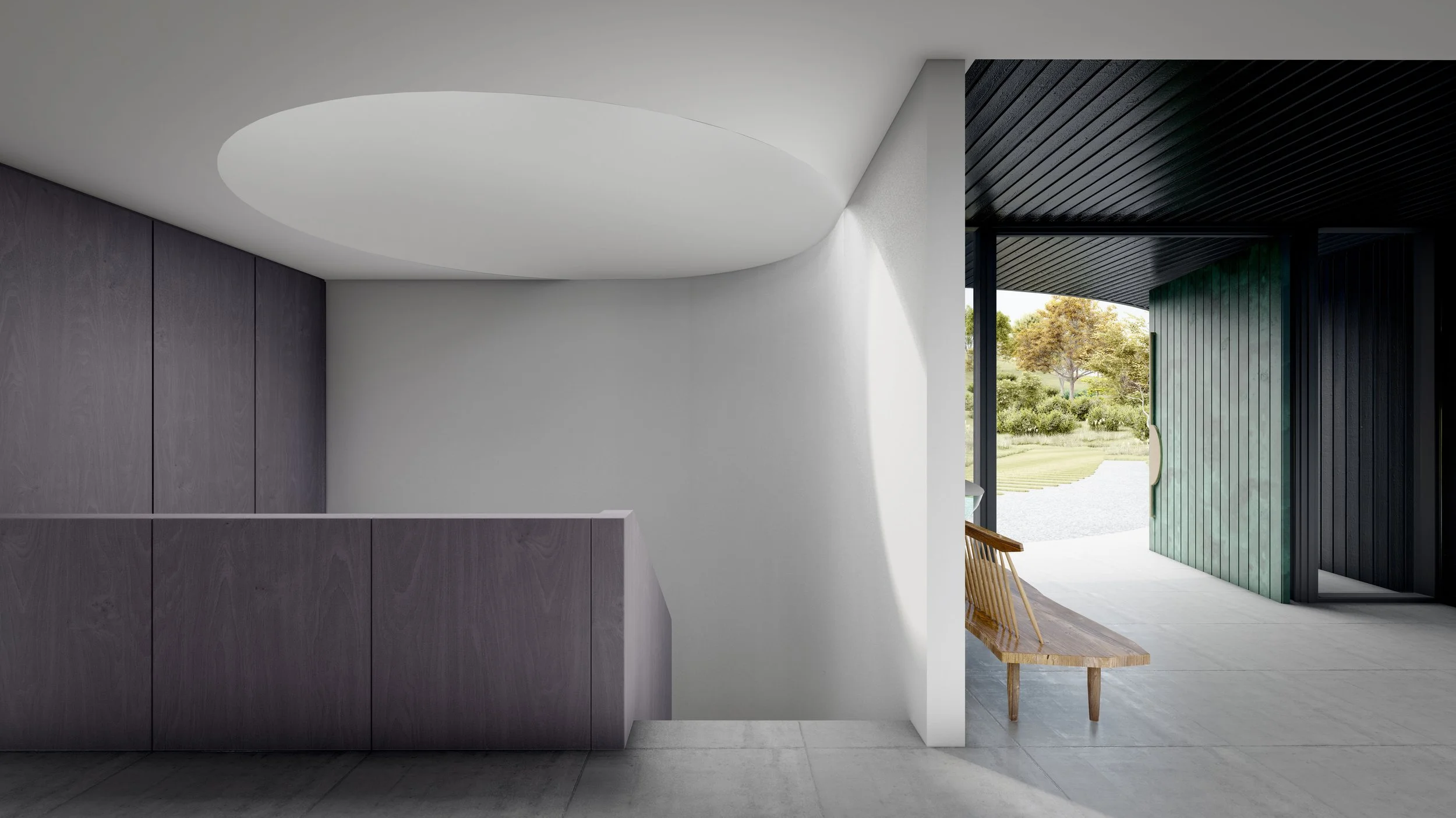 The entrance to the Y House has a circular stair and oculus that leads to the garage, white walls, a wooden bench, and an open door revealing a garden outside with trees and shrubbery.