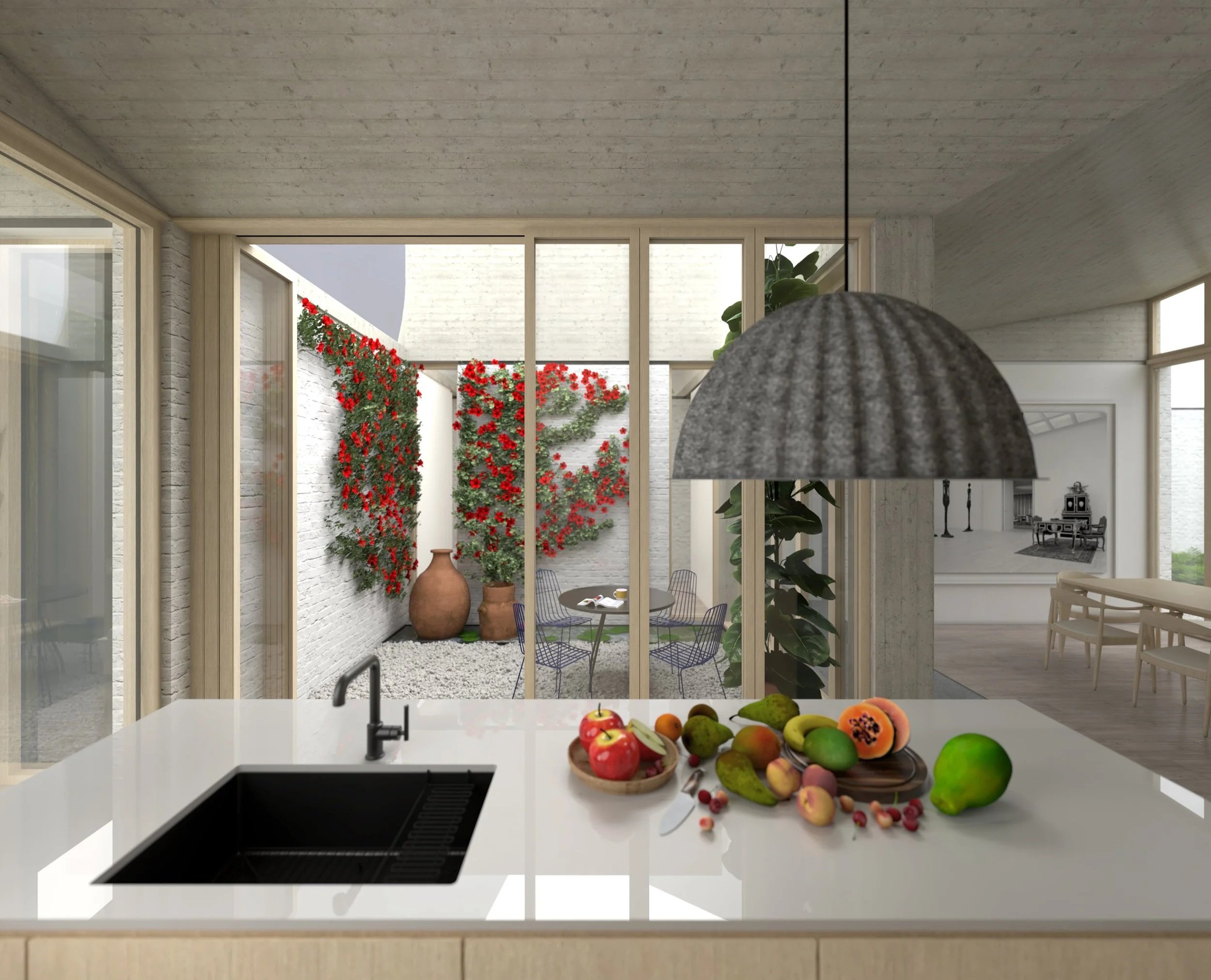 Modern kitchen with white countertop, black sink, and a hanging light fixture. Large windows and sliding glass doors lead to an outdoor patio with red flowering plants, clay pots, and patio furniture at the Courtyard House