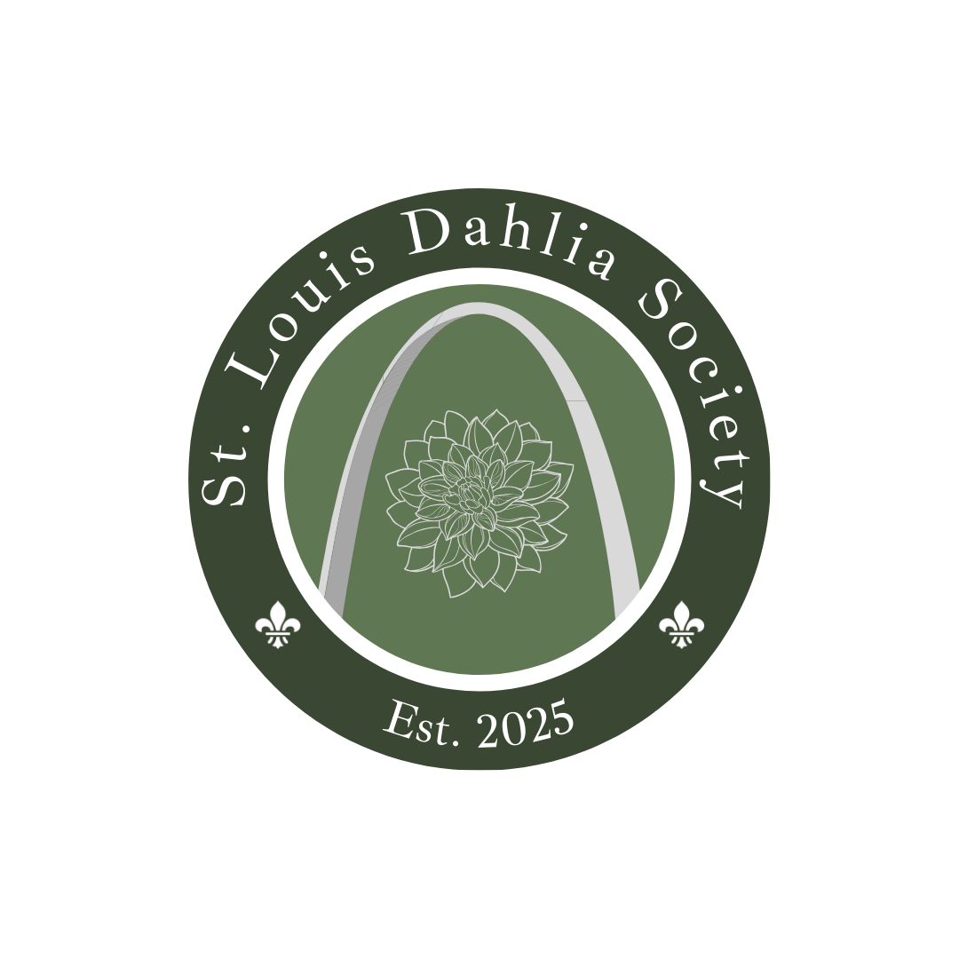 A circular logo with a dark green outer ring that reads 'St. Louis Dahlia Society' with small fleur-de-lis symbols, and 'Est. 2025' at the bottom. Inside, a stylized illustration of an arch with a dahlia flower in the center.