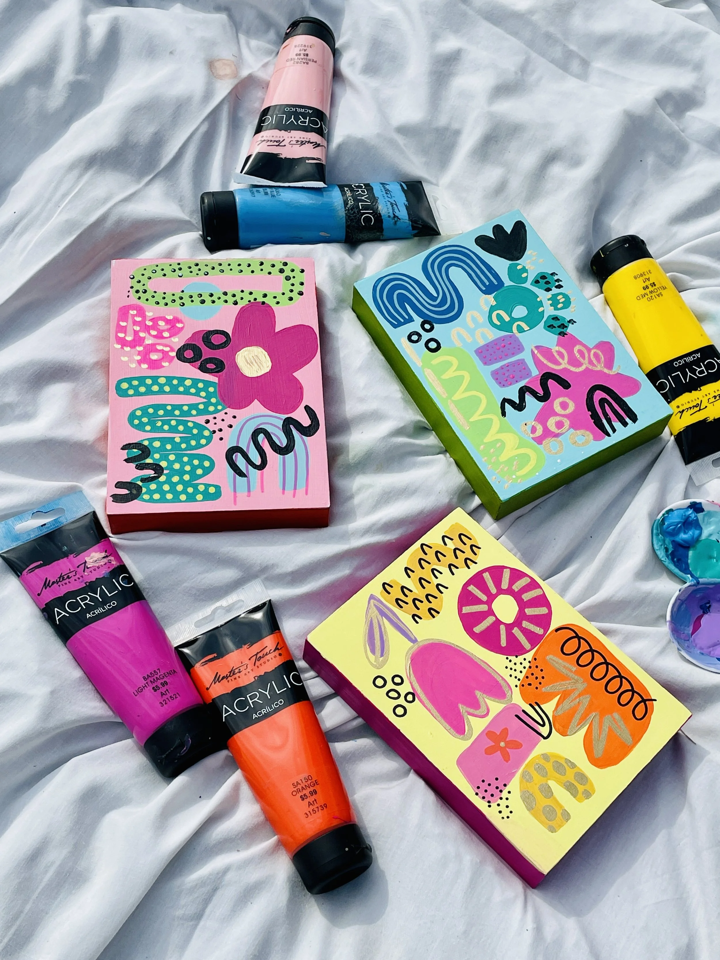 Colorful abstract paintings on canvases 