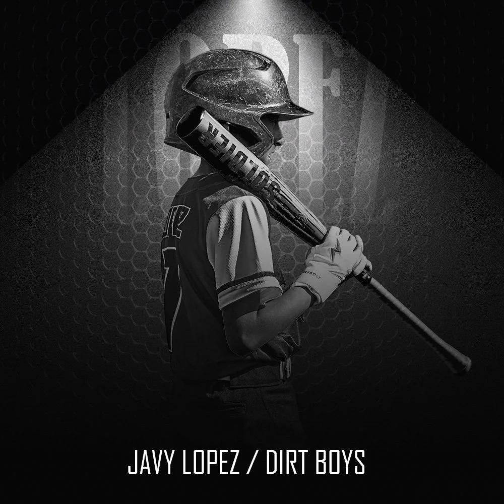 A person wearing a baseball helmet, racing gloves, and a sports jersey, holding a baseball bat resting on their shoulder, with a dark background and the text "Javy Lopez / Dirt Boys" at the bottom.
