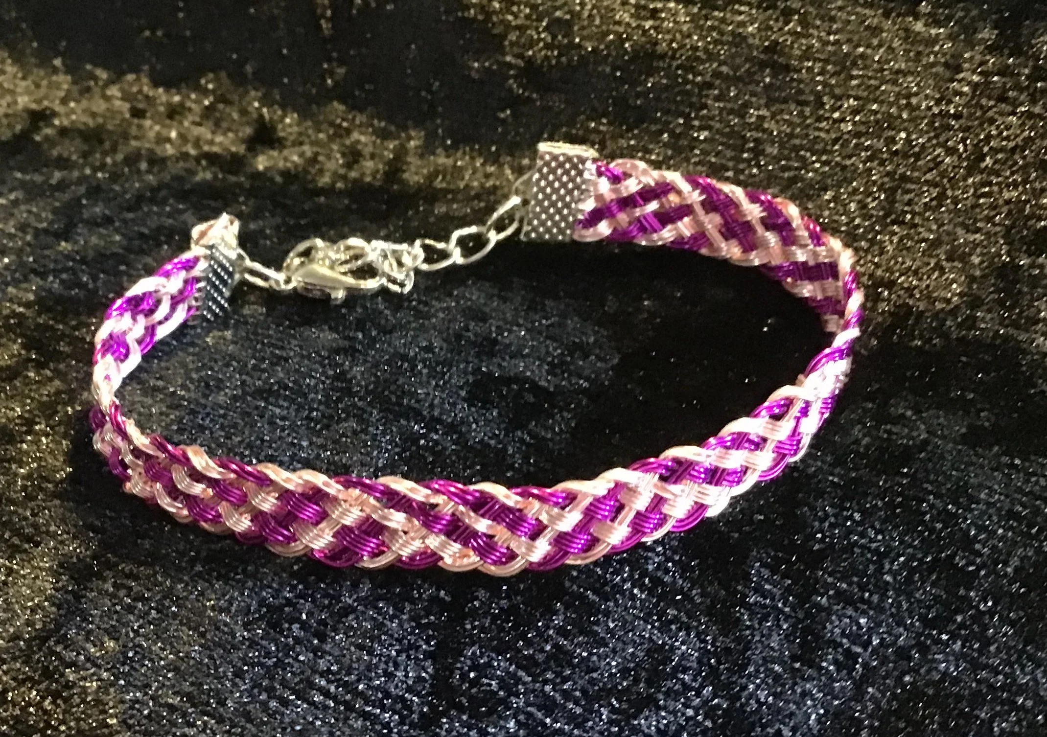 Hand woven wire Kumihimo adjustable colored bracelet.