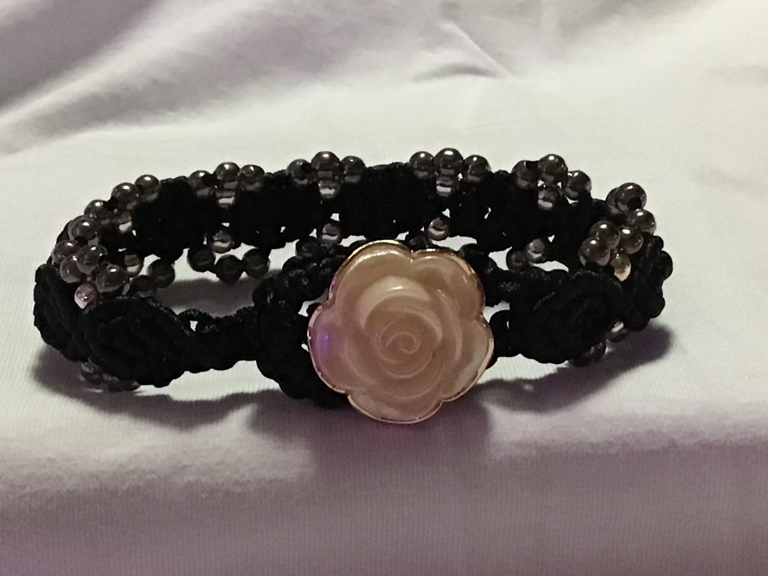 Hand woven black macrame bracelet.