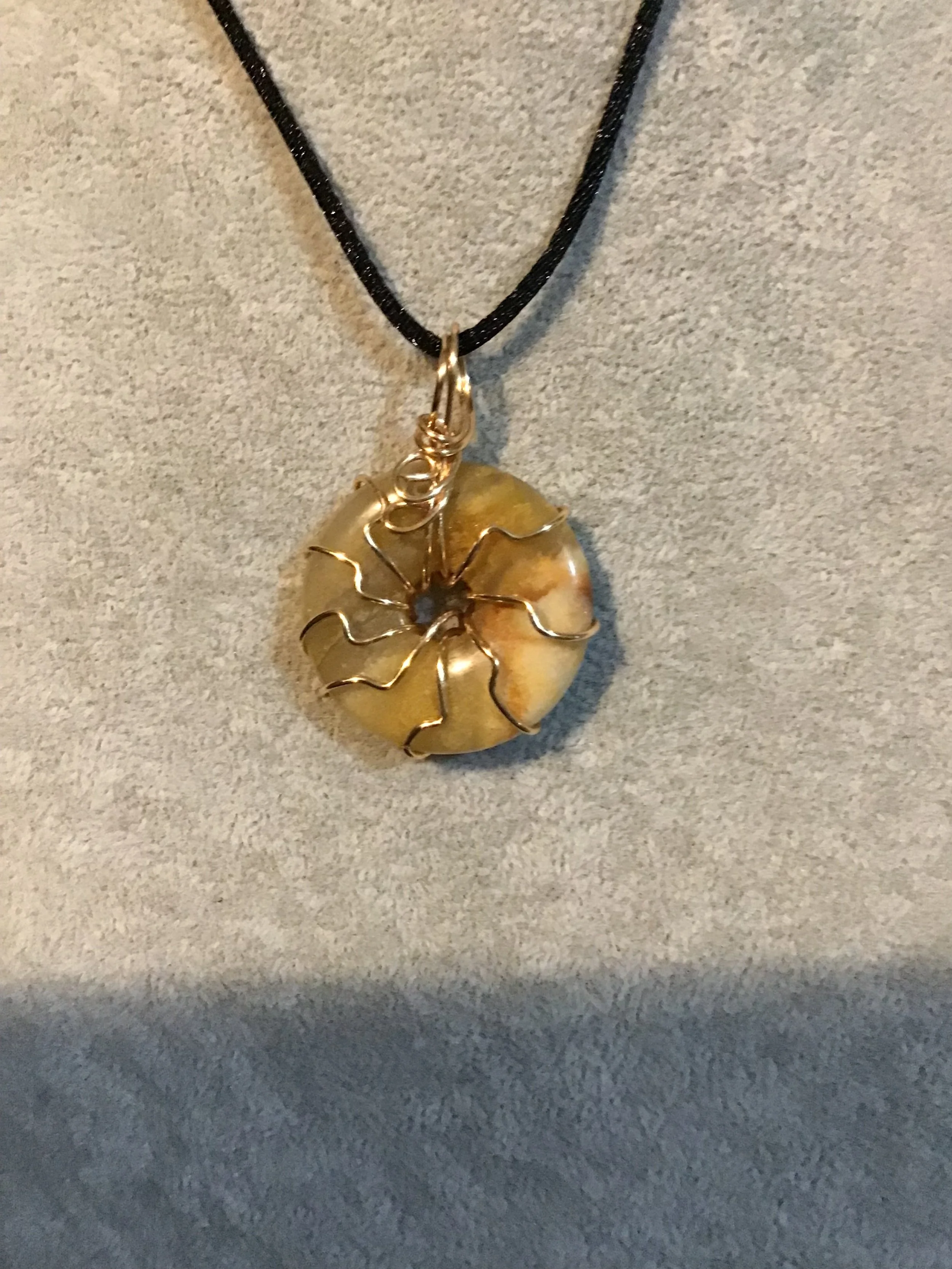 Wire wrapped Jasper gemstone donut on18 black satin adjustable cord