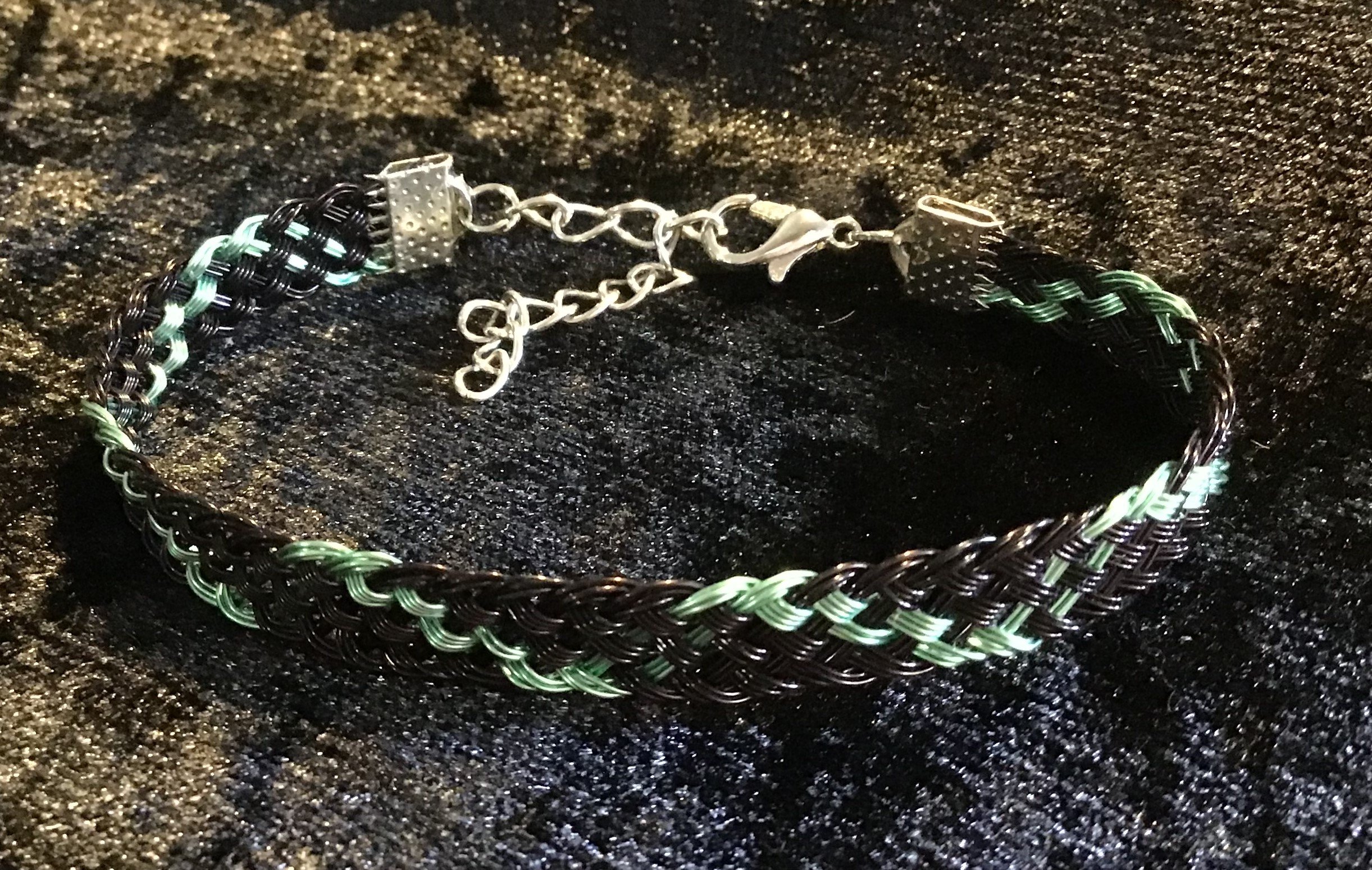 Hand woven wire Kumihimo adjustable colored bracelet.