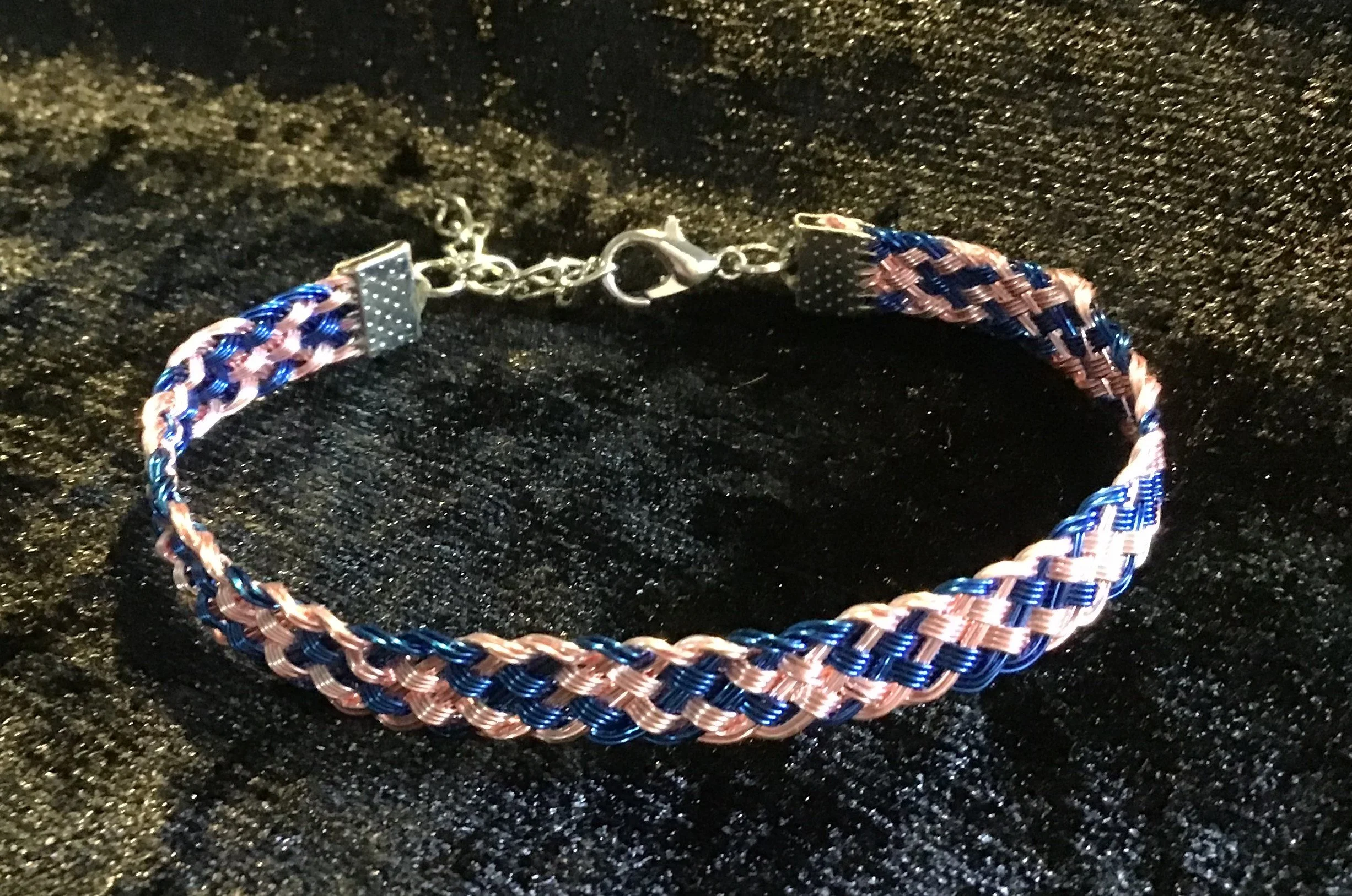 Hand woven wire Kumihimo adjustable colored bracelet.