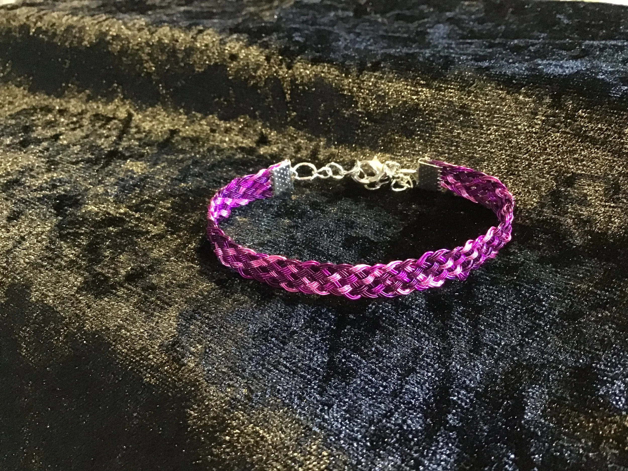 Hand woven wire Kumihimo adjustable colored bracelet.