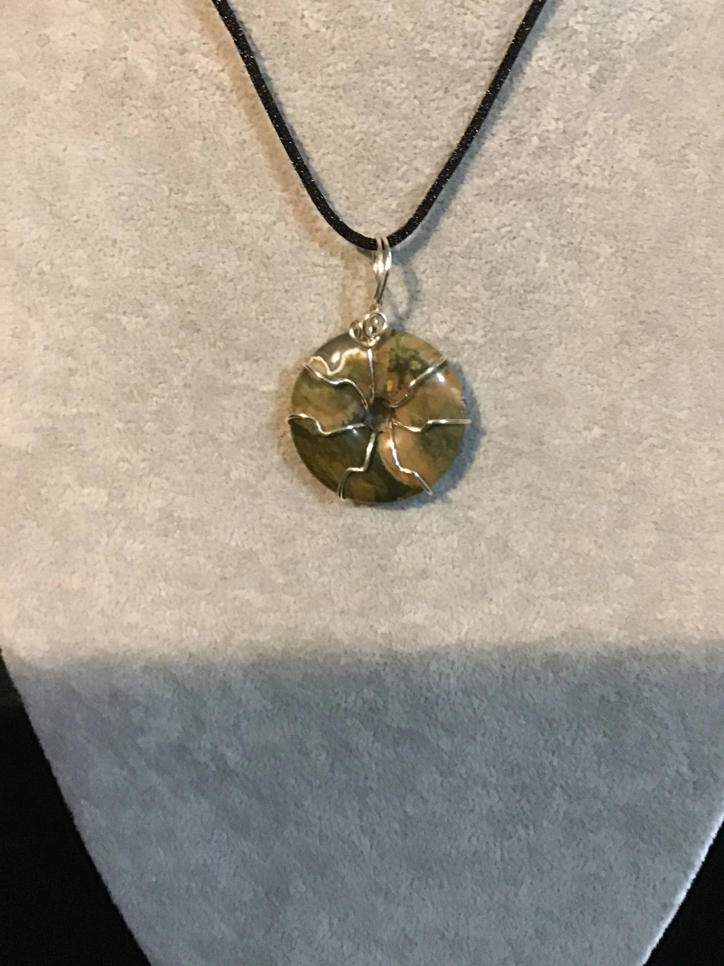 Wire wrapped Black Crazy Lace Agate gemstone donut on18 black satin adjustable cord