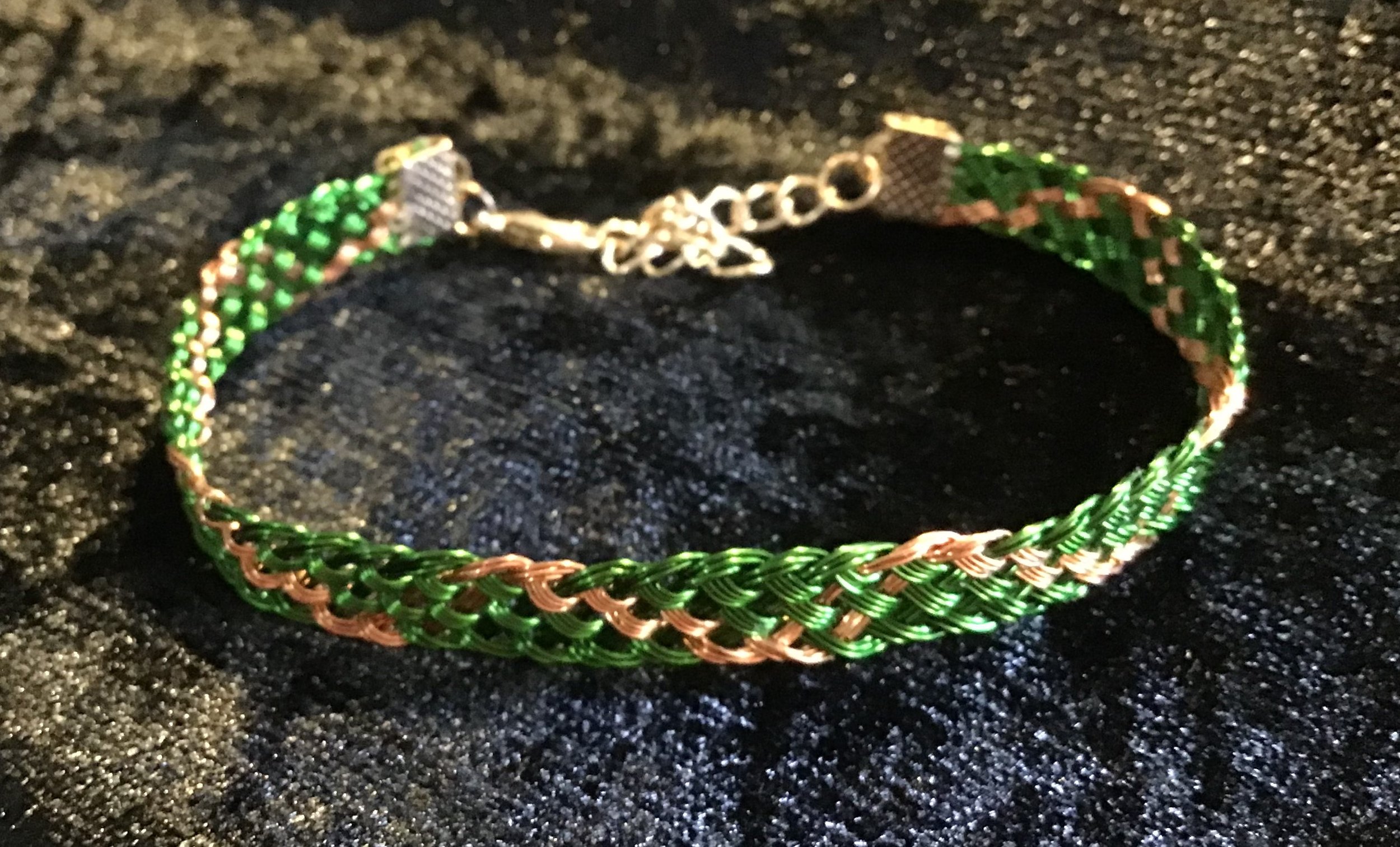 Hand woven wire Kumihimo adjustable colored bracelet.