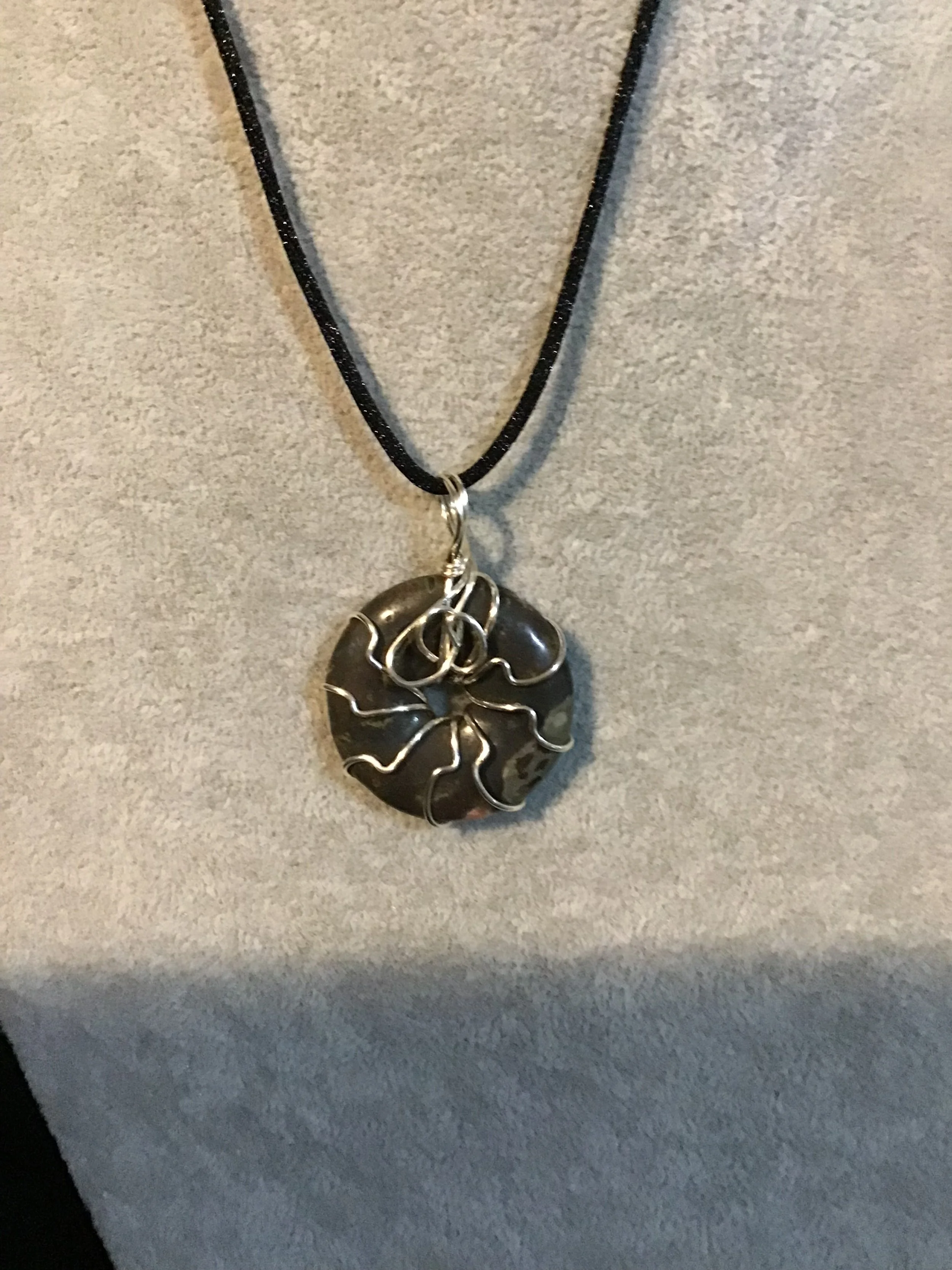 Wire wrapped Plum Blossom Jasper gemstone donut on18 black satin adjustable cord