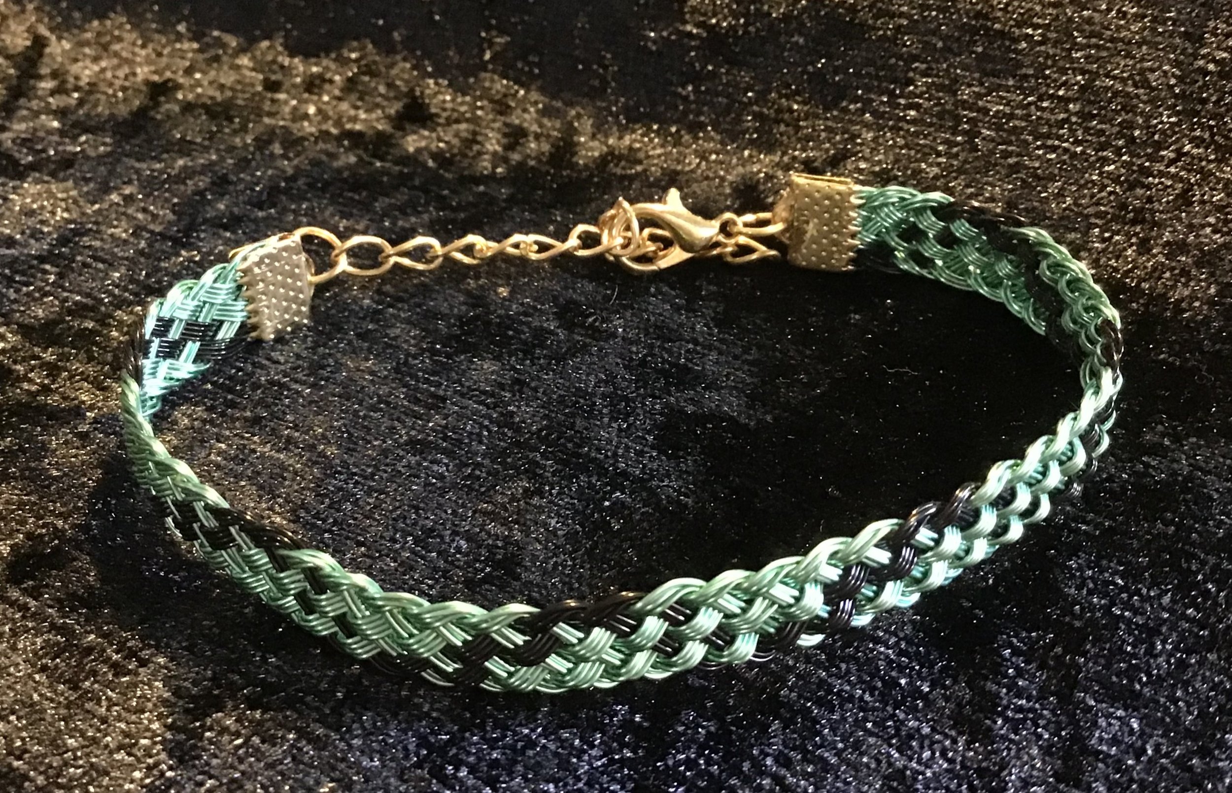 Hand woven wire Kumihimo adjustable colored bracelet.