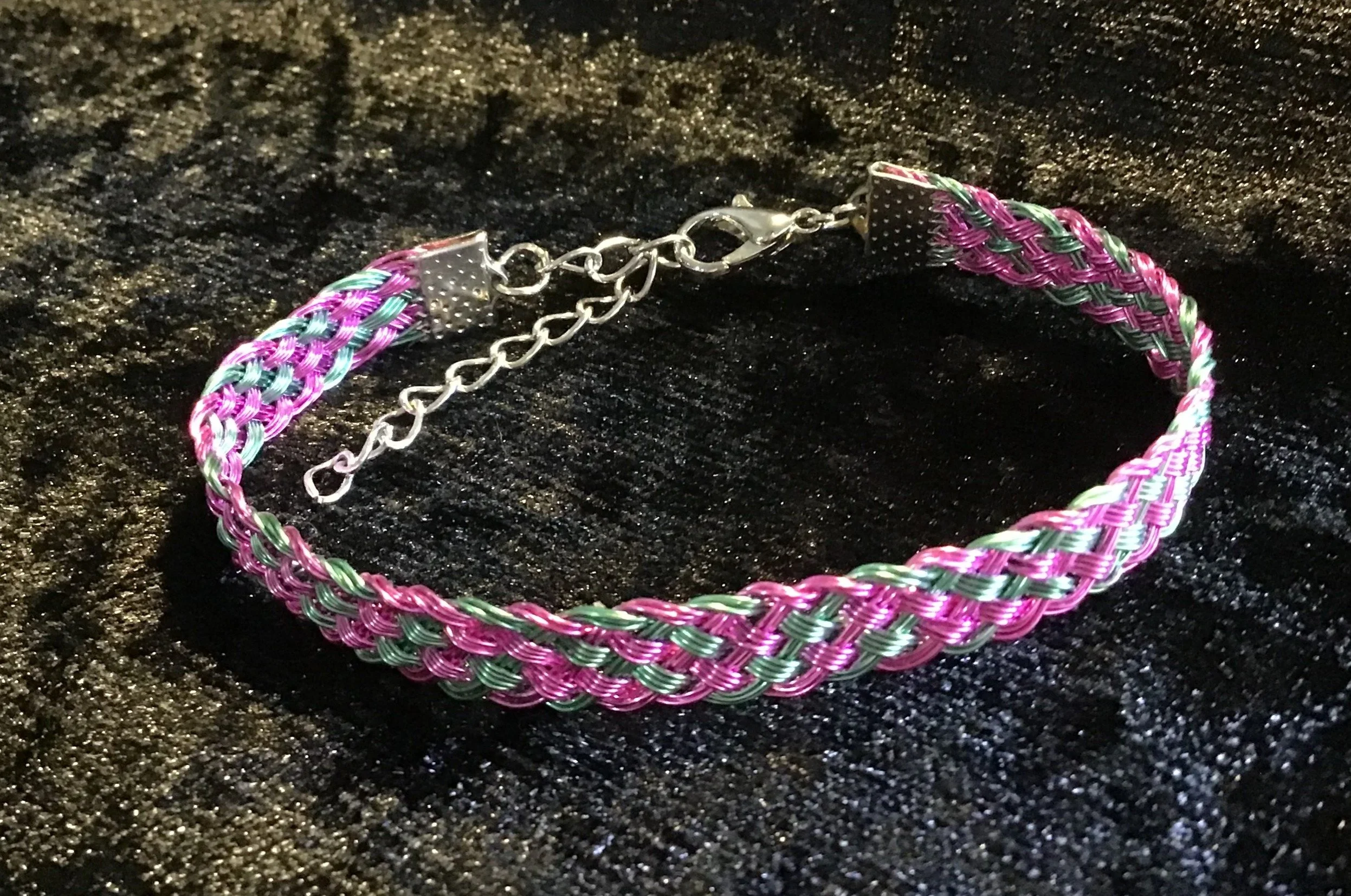 Hand woven wire Kumihimo adjustable colored bracelet.