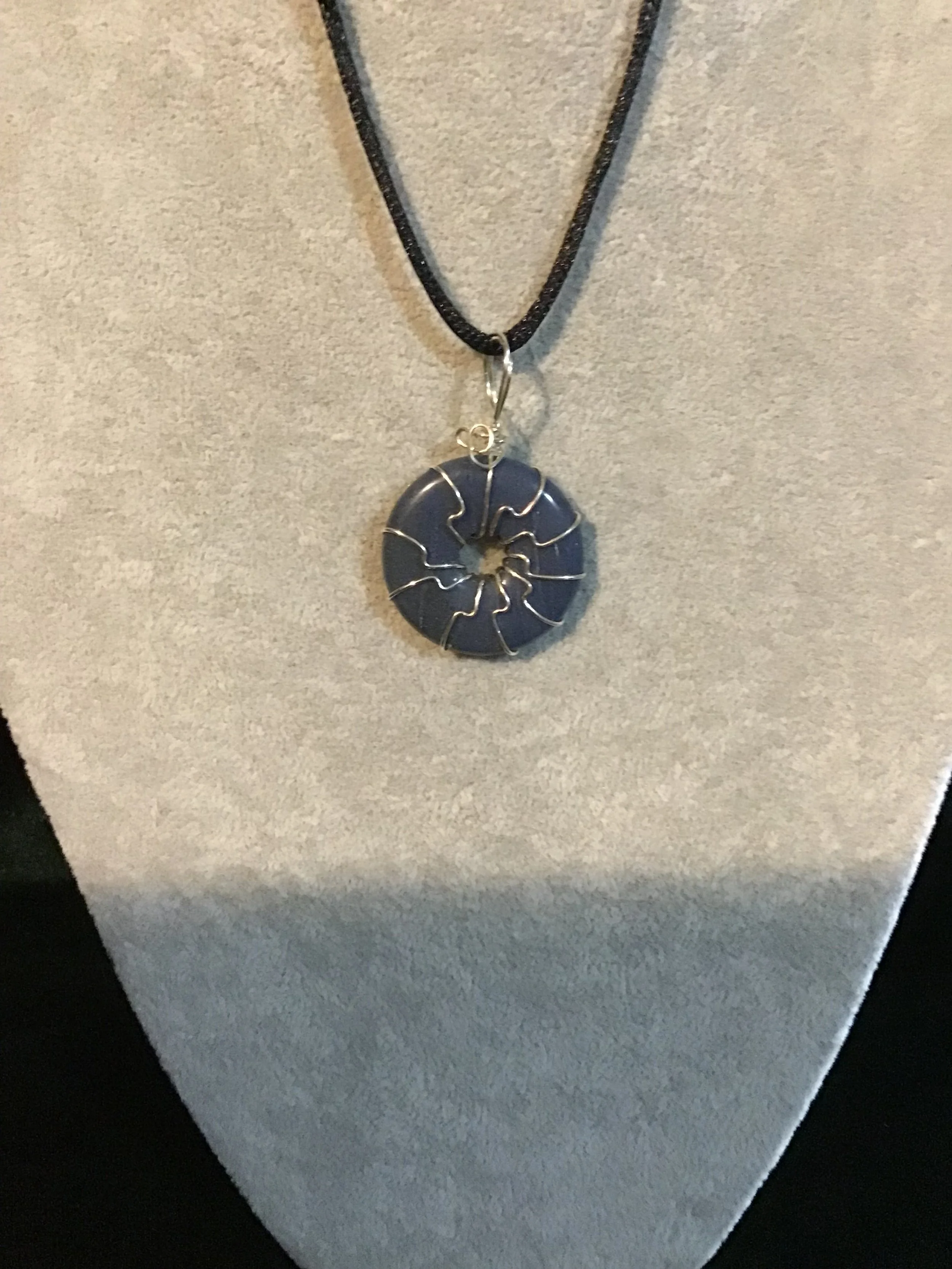 Wire wrapped Blue Aventurine gemstone donut on18 black satin adjustable cord
