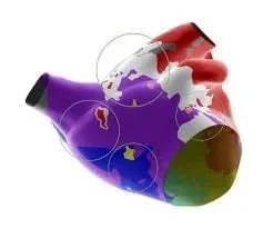 A human heart-shaped object painted with the flags of different countries.