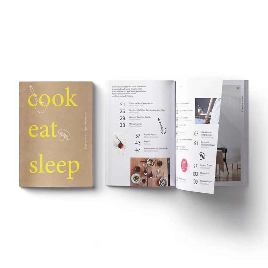 Ein Kochbuch mit dem Titel 'cook eat sleep' und einer geöffneten Seite mit einem Inhaltsverzeichnis.