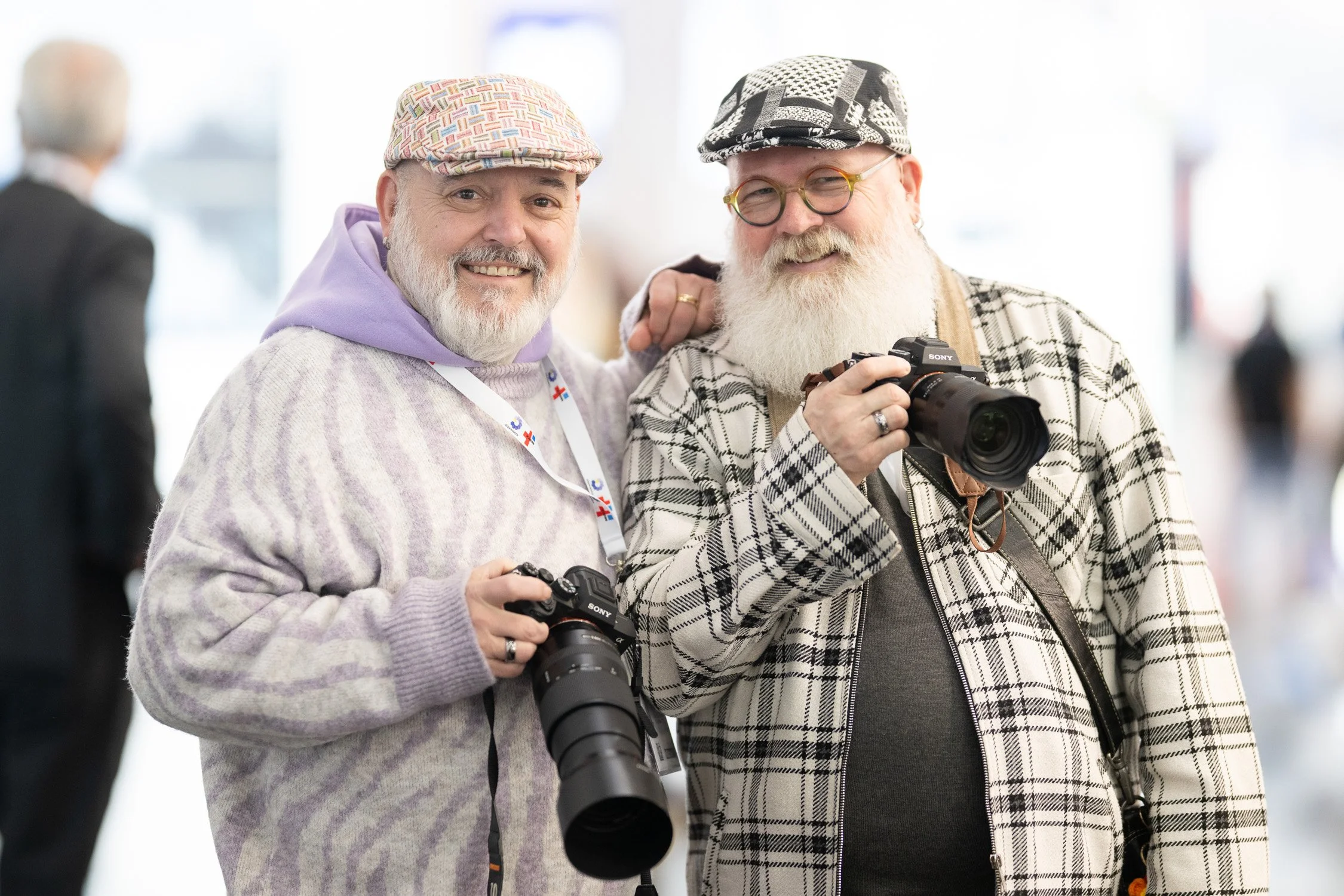 Messefotograf in Köln hält ein Beratungsgespräch auf der Messe fest