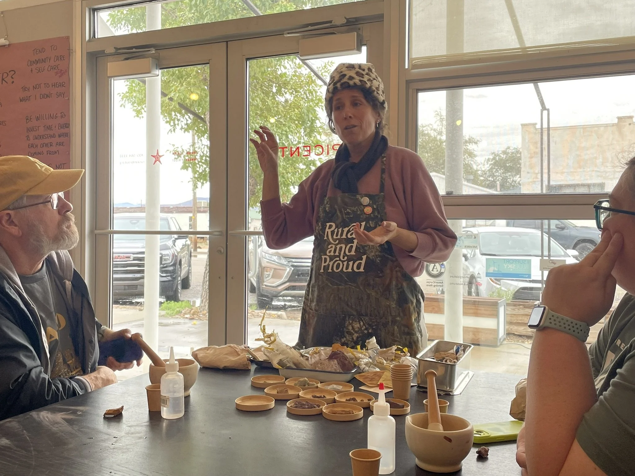 Elpitha Tsoutsounakis speaking to workshop participants about pigment making