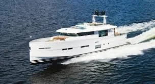 White luxury Delta Carbon 88 yacht sailing on the water