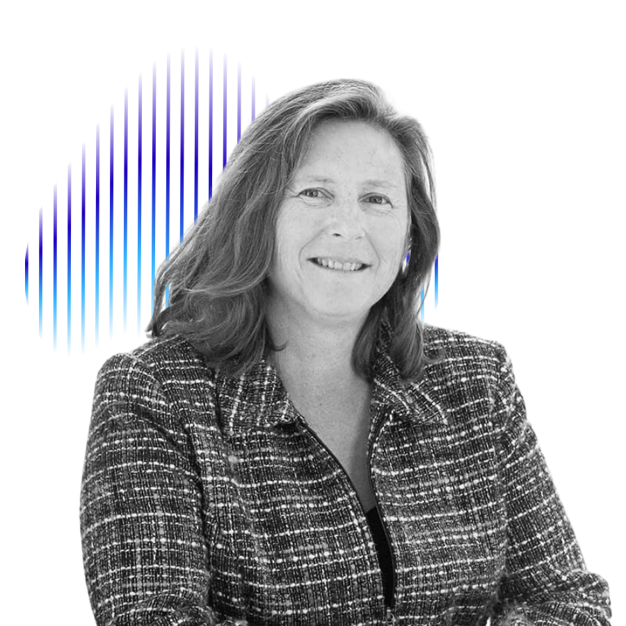 A woman with shoulder-length hair smiling, wearing a patterned blazer, in front of a digital background with blue, green, and red elements.