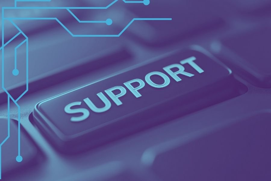 Close-up of a computer keyboard with a key labeled 'SUPPORT,' highlighted with a blue overlay and digital circuit graphics in the background.