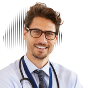 Mountain range with rocky peaks in the distance and rolling green hills in the foreground under a clear sky.