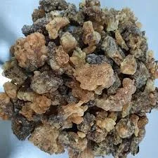 Close-up of a cluster of irregularly shaped brown and gray rocks or mineral formations.