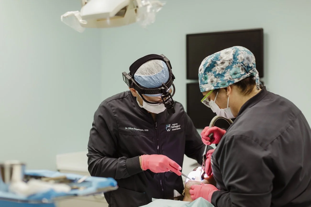 Dr. Feigenbaum performs an oral surgery procedure
