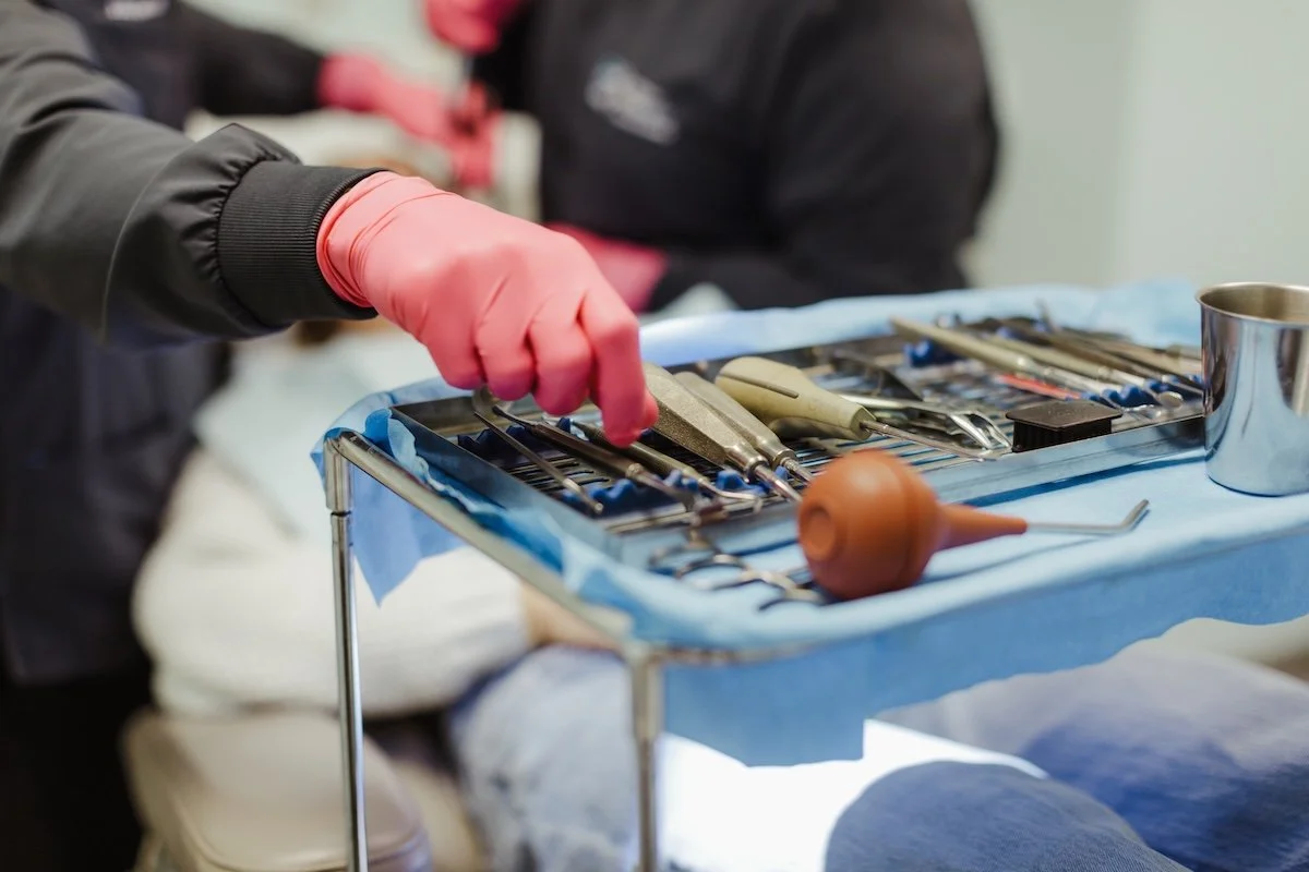 Oral surgeon uses disinfected equipment.