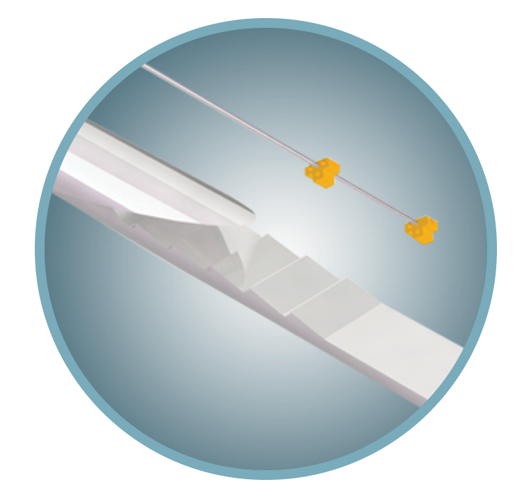 Close-up of a white drone with a blue background, showing two small yellow drone parts attached to a red line.