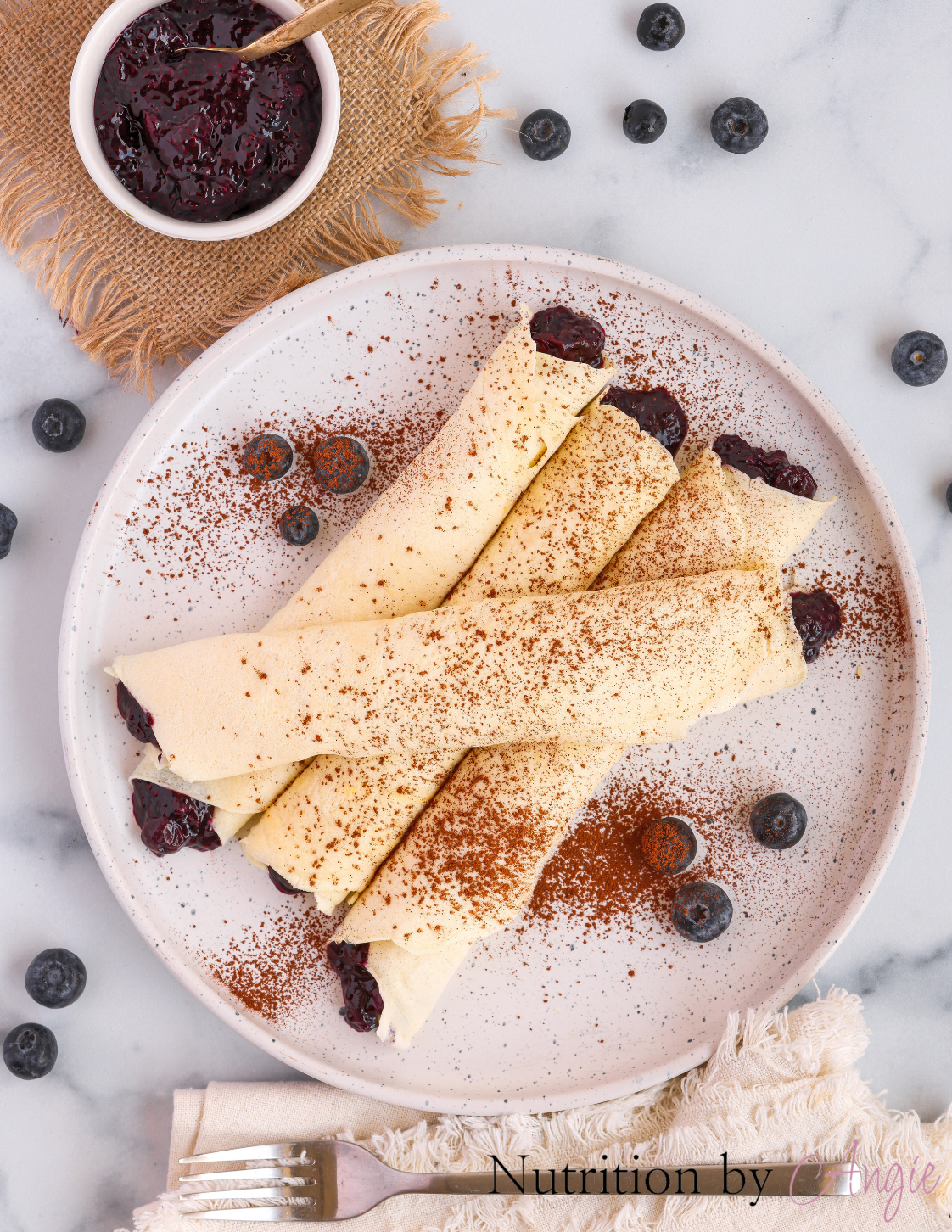 Protein Crepes with Blueberry Sauce