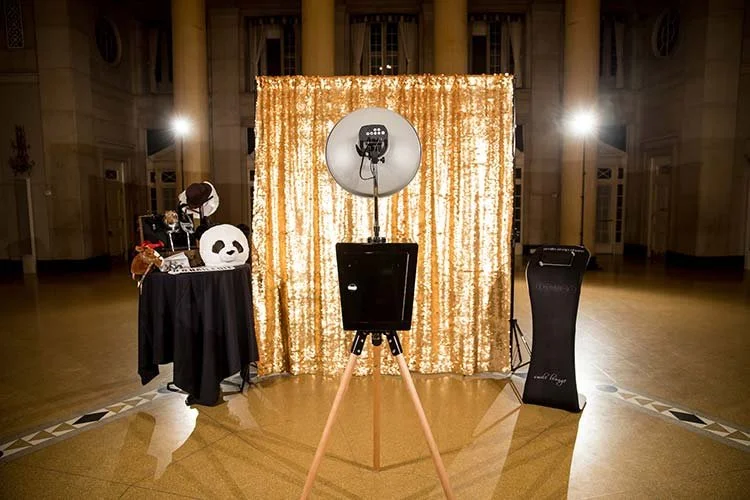 Seattle's premier photo booth rentals, including backdrops and props with every package