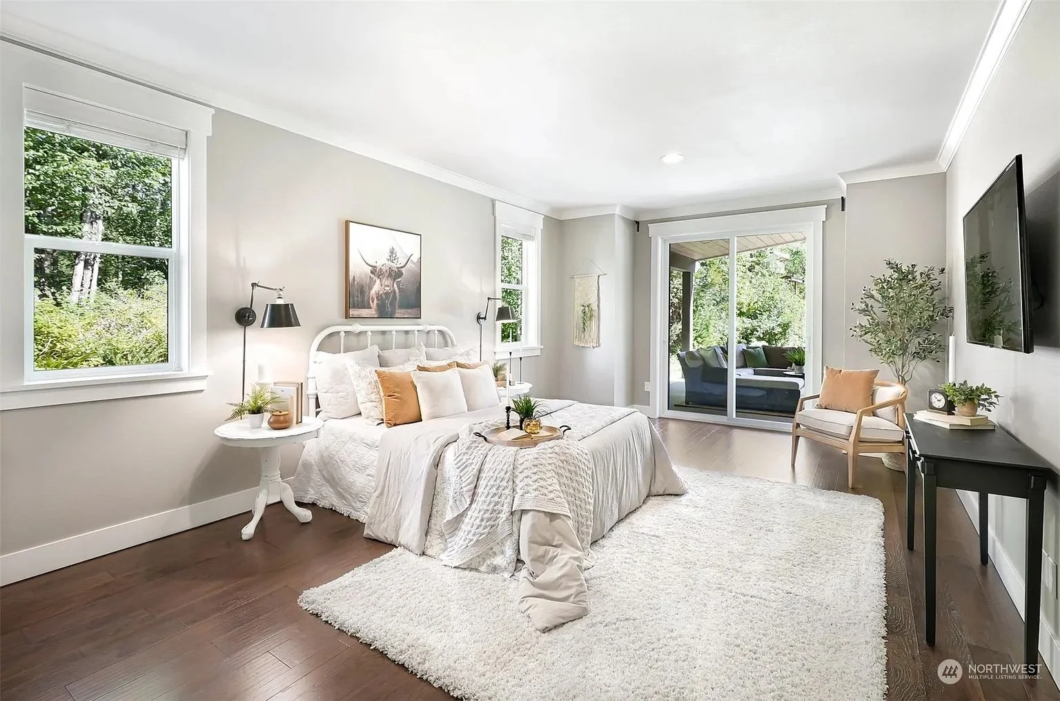 Spacious master bedroom in a custom-built legacy home featuring precision insulation for superior thermal control and acoustic privacy.