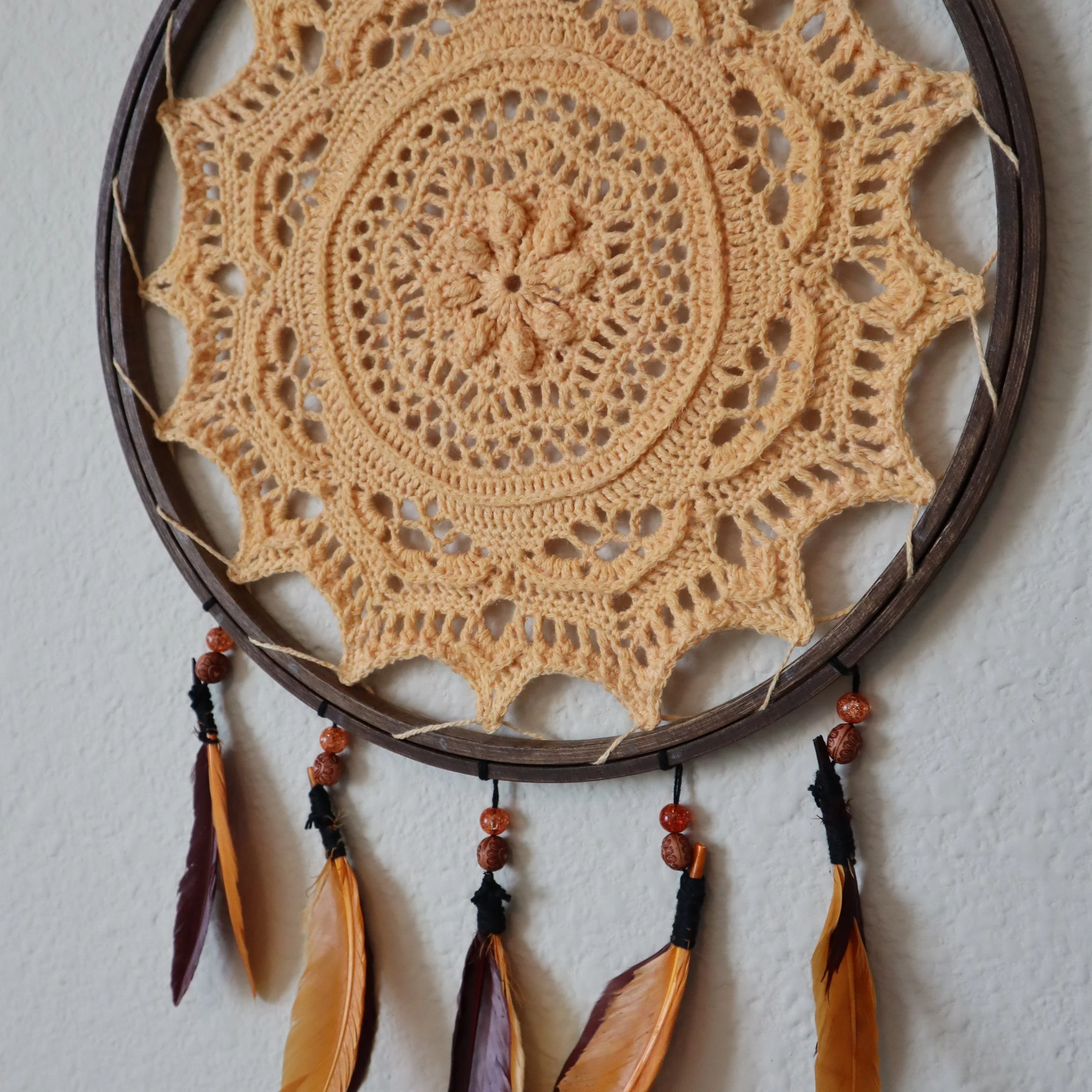 Hand dyed orange doily dream catcher